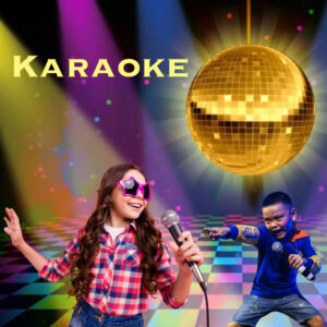 Child singing karaoke on stage during Flipz Disco Night.